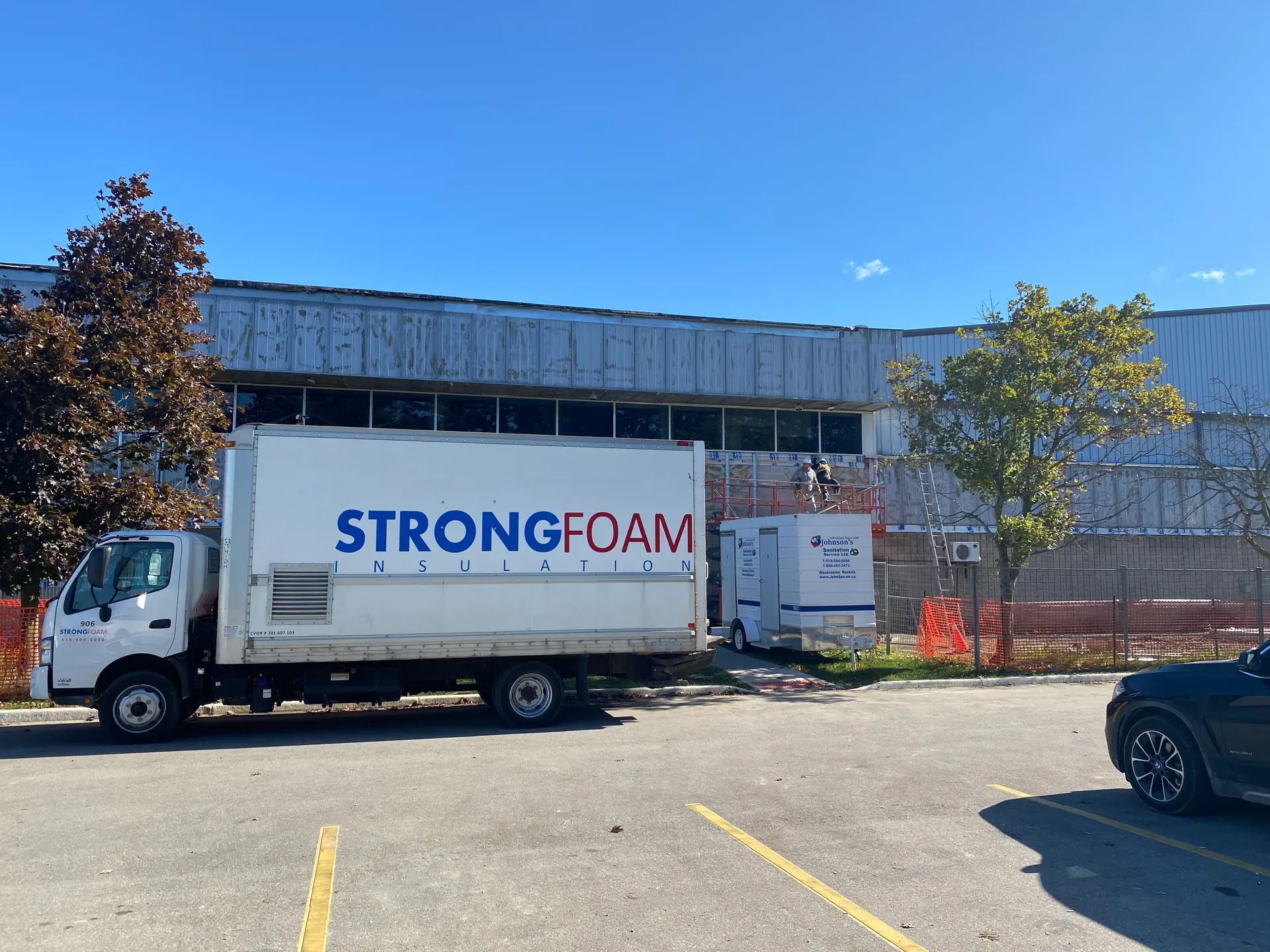 Strong Foam truck parked at a commercial jobsite